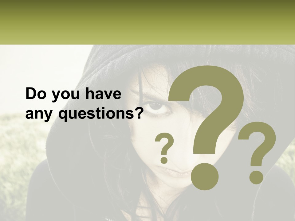 A Woman In A Hoodie Is Looking At The Camera PowerPoint Template