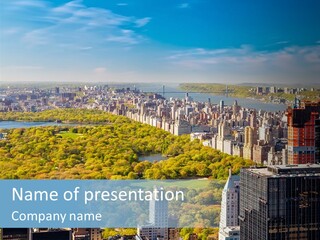 An Aerial View Of A City With Lots Of Trees PowerPoint Template