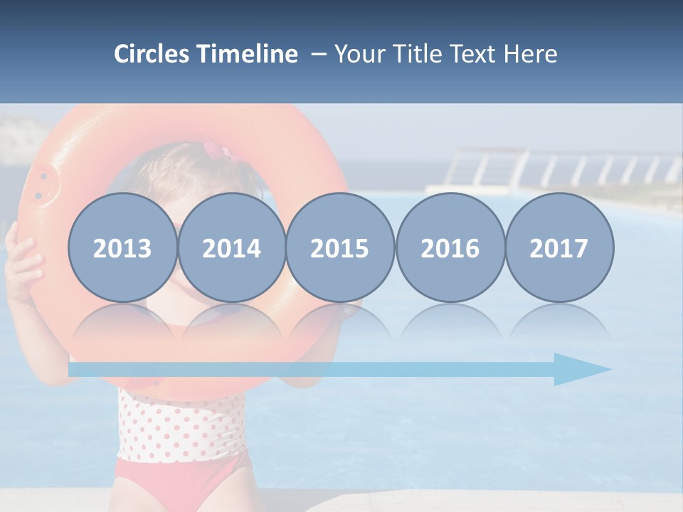 A Little Girl Holding An Orange Life Preserver In Front Of A Swimming Pool PowerPoint Template
