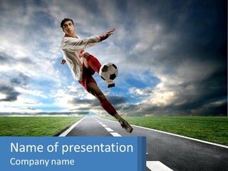 A Man Kicking A Soccer Ball On A Road PowerPoint Template
