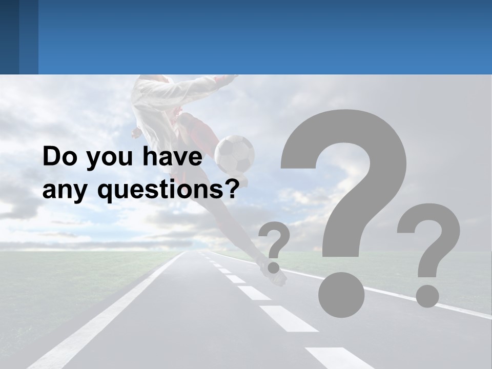 A Man Kicking A Soccer Ball On A Road PowerPoint Template