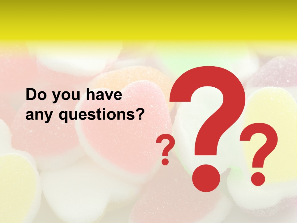 A Pile Of Candy Hearts Sitting On Top Of A Table PowerPoint Template