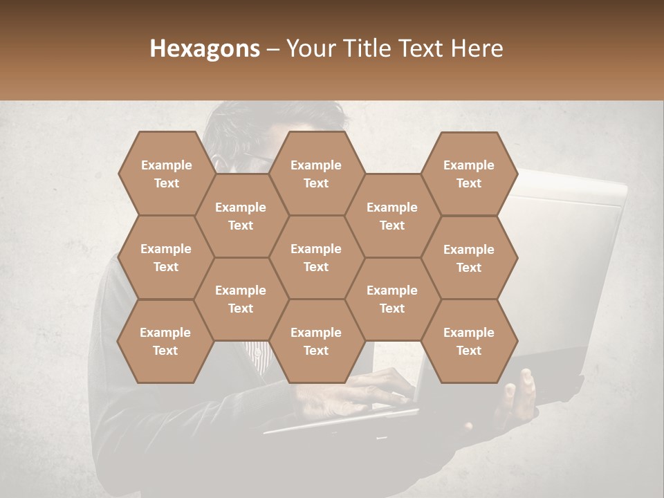 A Man In Glasses Using A Laptop Computer PowerPoint Template