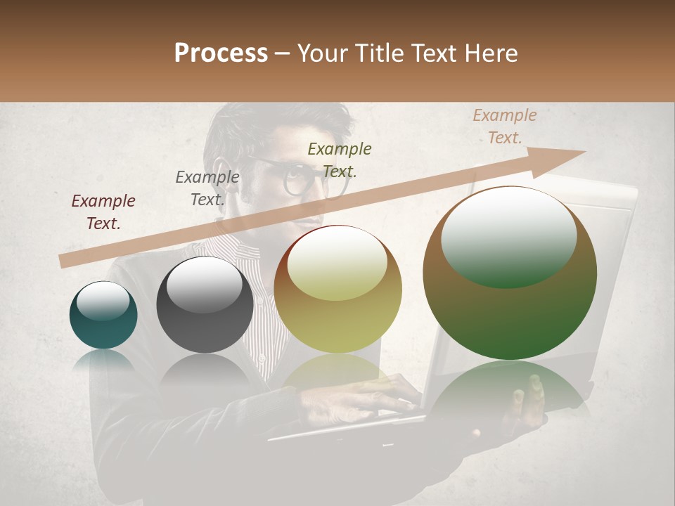 A Man In Glasses Using A Laptop Computer PowerPoint Template