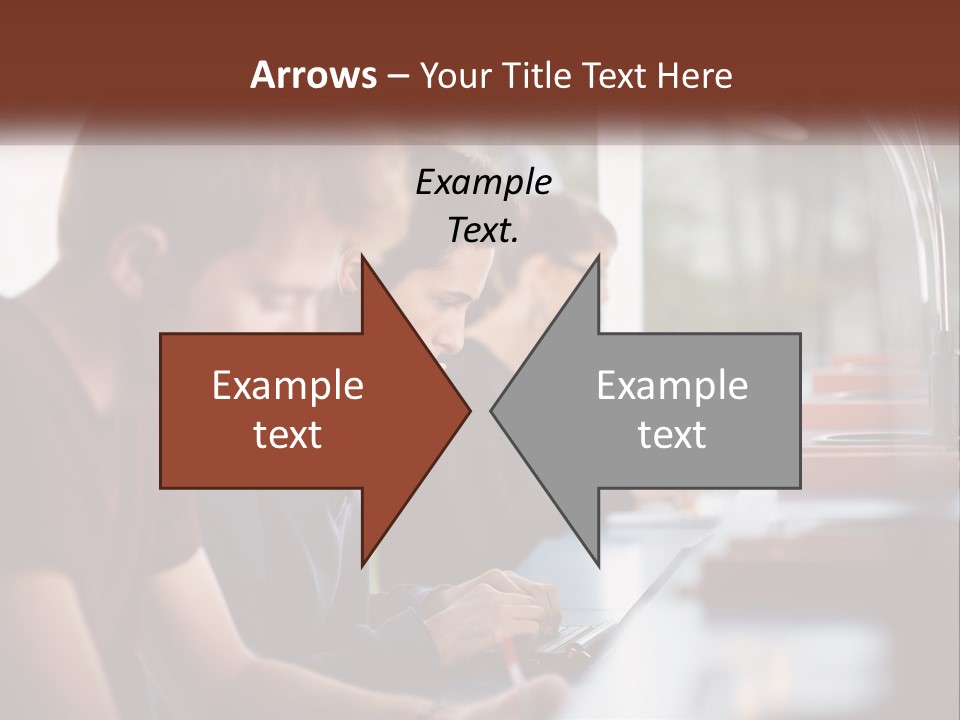 A Group Of Young Men Sitting At A Table Working On Laptops PowerPoint Template