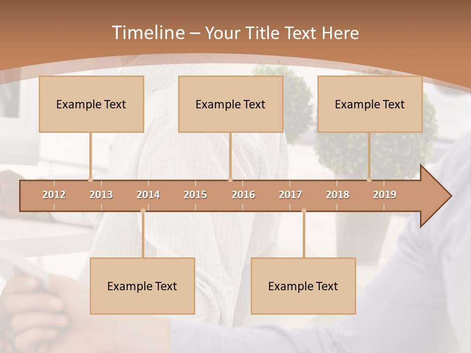 Two Men Shaking Hands In Front Of A Computer Screen PowerPoint Template