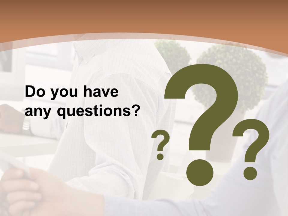 Two Men Shaking Hands In Front Of A Computer Screen PowerPoint Template