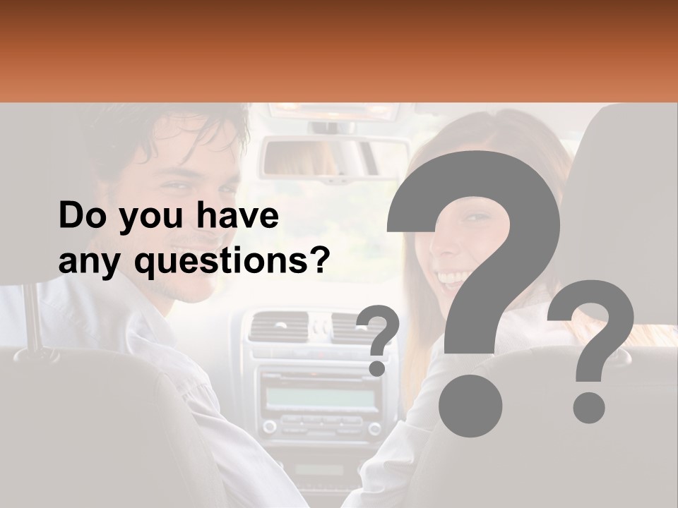 A Man And Woman Sitting In The Back Seat Of A Car PowerPoint Template