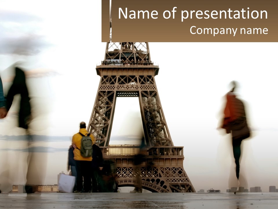 A Group Of People Standing In Front Of The Eiffel Tower PowerPoint Template