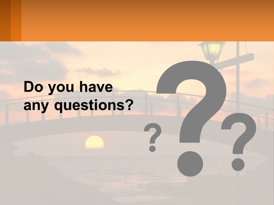 A Bridge Over A Body Of Water At Sunset PowerPoint Template