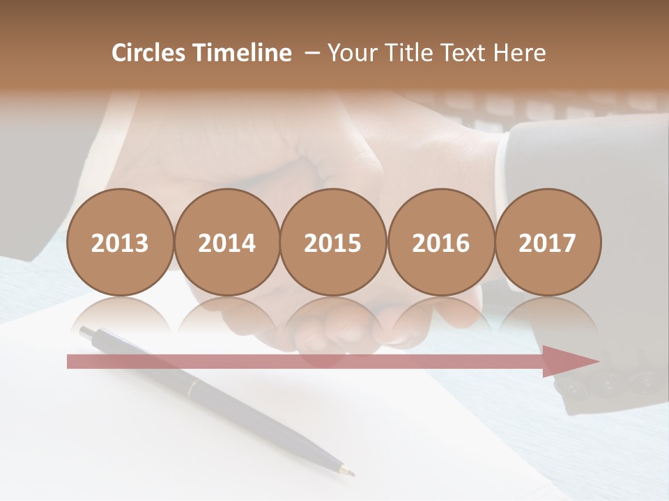 Two People Shaking Hands In Front Of A Keyboard PowerPoint Template