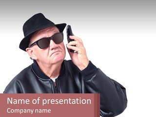 A Man In A Hat And Sunglasses Talking On A Cell Phone PowerPoint Template