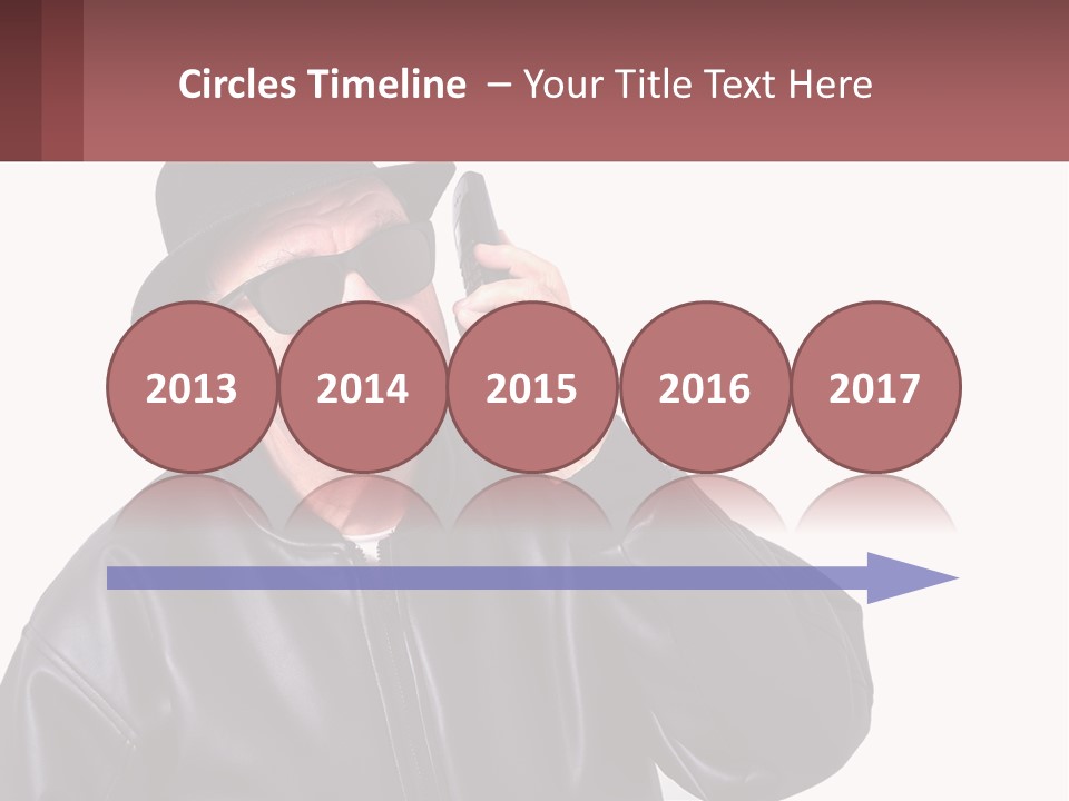 A Man In A Hat And Sunglasses Talking On A Cell Phone PowerPoint Template