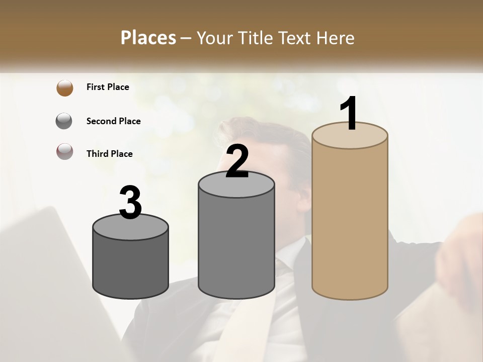 A Man In A Suit Sitting In Front Of A Laptop PowerPoint Template