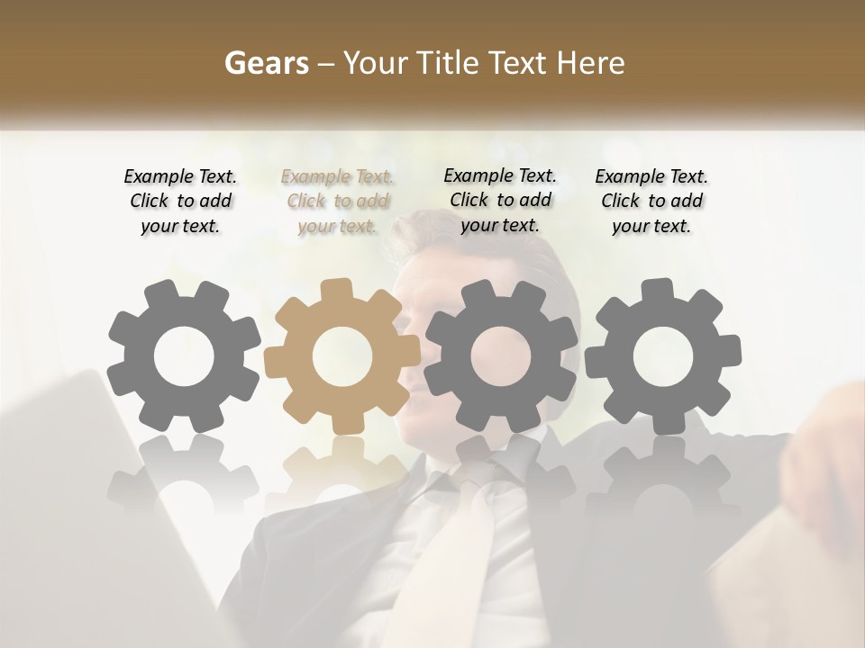 A Man In A Suit Sitting In Front Of A Laptop PowerPoint Template