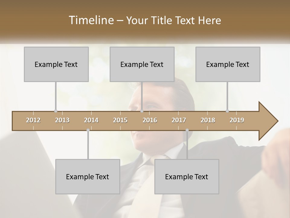A Man In A Suit Sitting In Front Of A Laptop PowerPoint Template