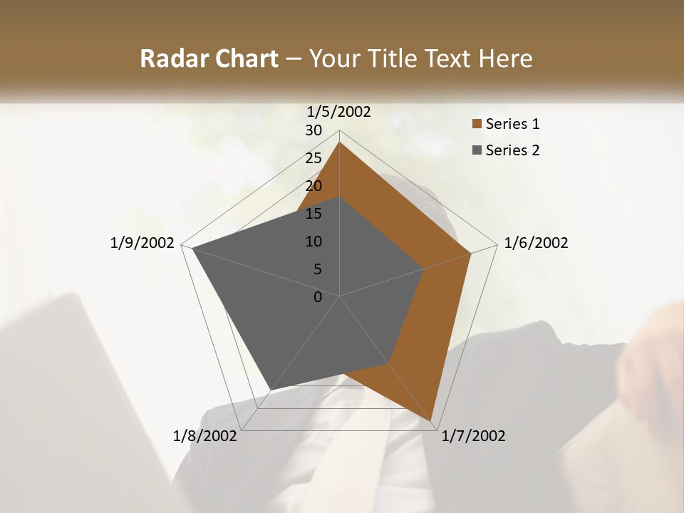 A Man In A Suit Sitting In Front Of A Laptop PowerPoint Template