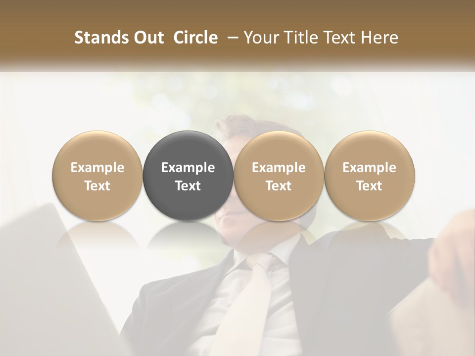 A Man In A Suit Sitting In Front Of A Laptop PowerPoint Template