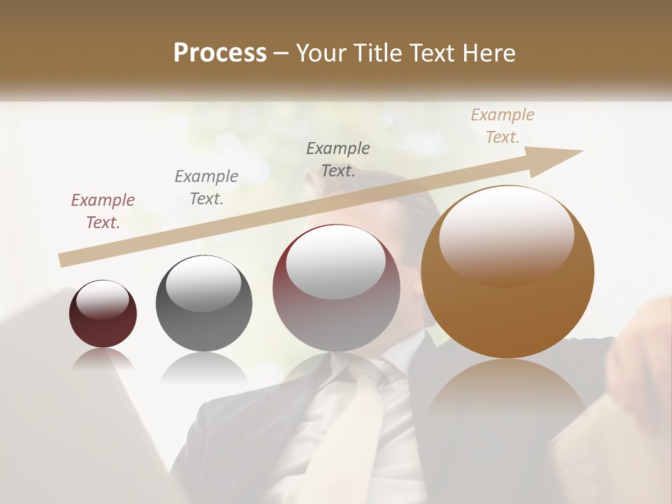 A Man In A Suit Sitting In Front Of A Laptop PowerPoint Template