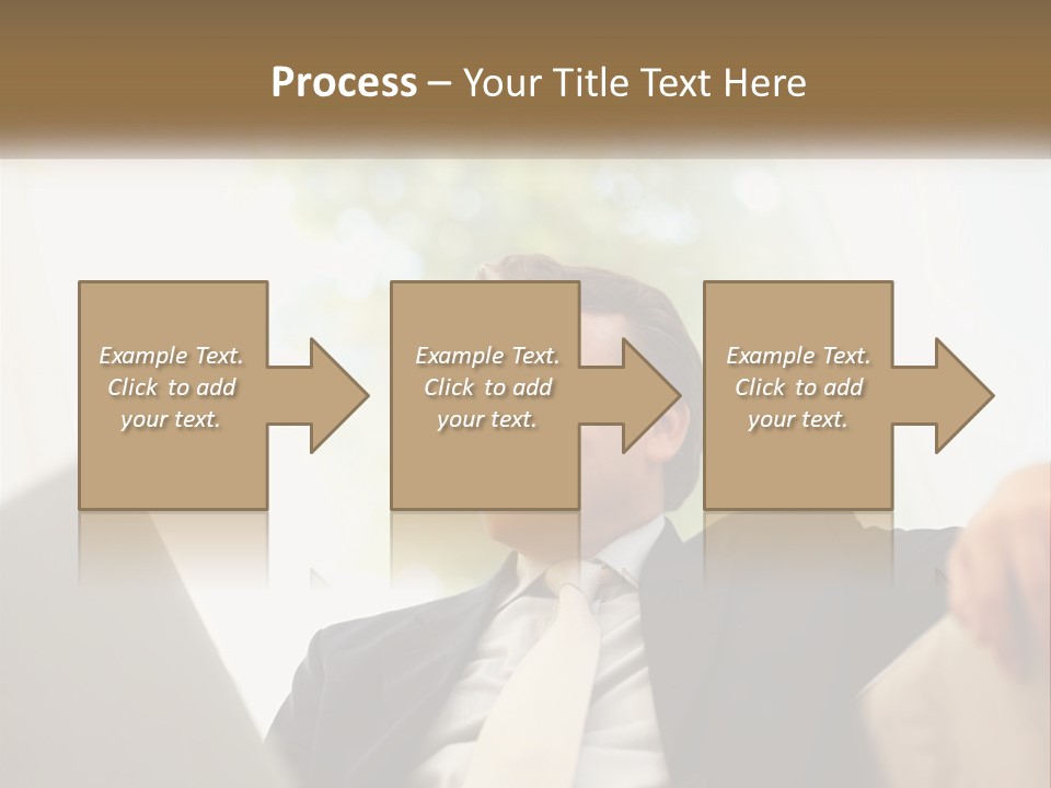 A Man In A Suit Sitting In Front Of A Laptop PowerPoint Template