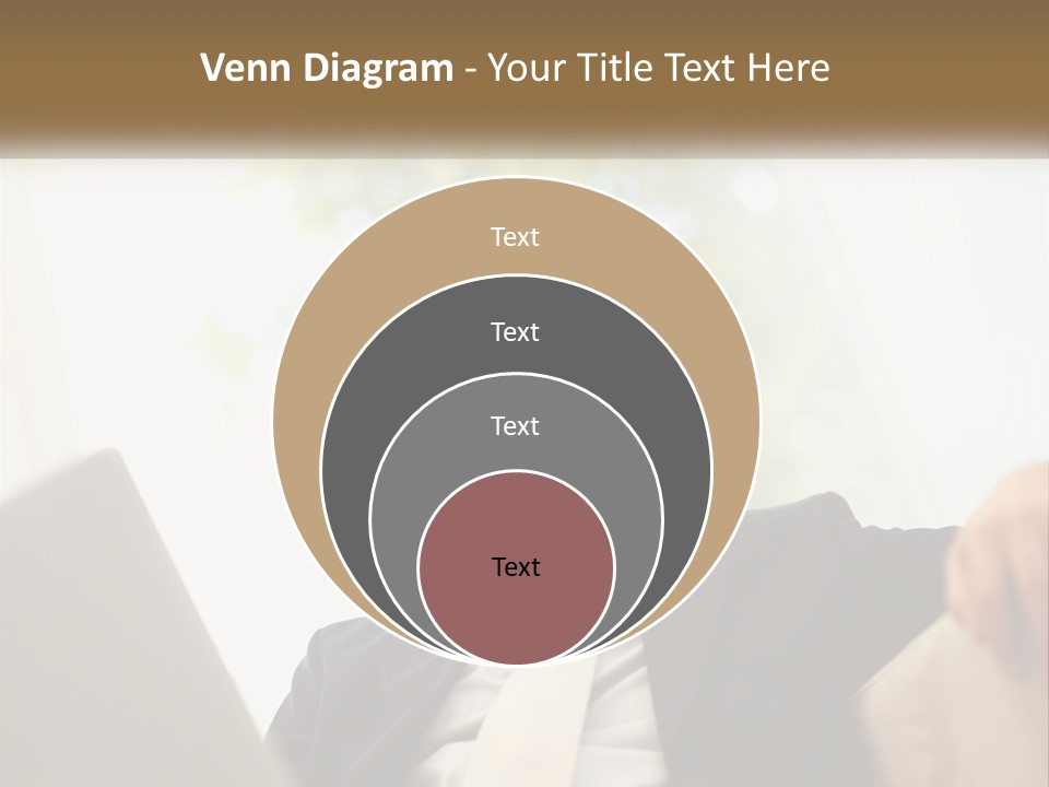 A Man In A Suit Sitting In Front Of A Laptop PowerPoint Template