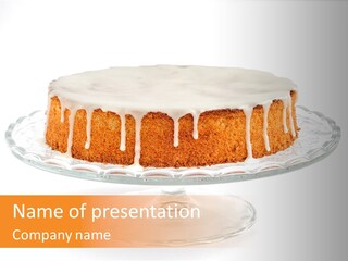 A Cake With White Icing On A Glass Plate PowerPoint Template