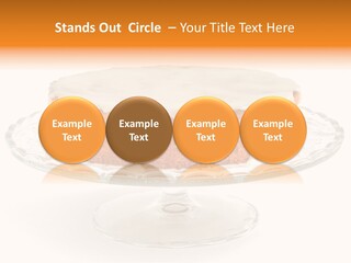 A Cake With White Icing On A Glass Plate PowerPoint Template