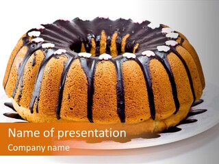 A Bundt Cake With Chocolate Icing On A Plate PowerPoint Template
