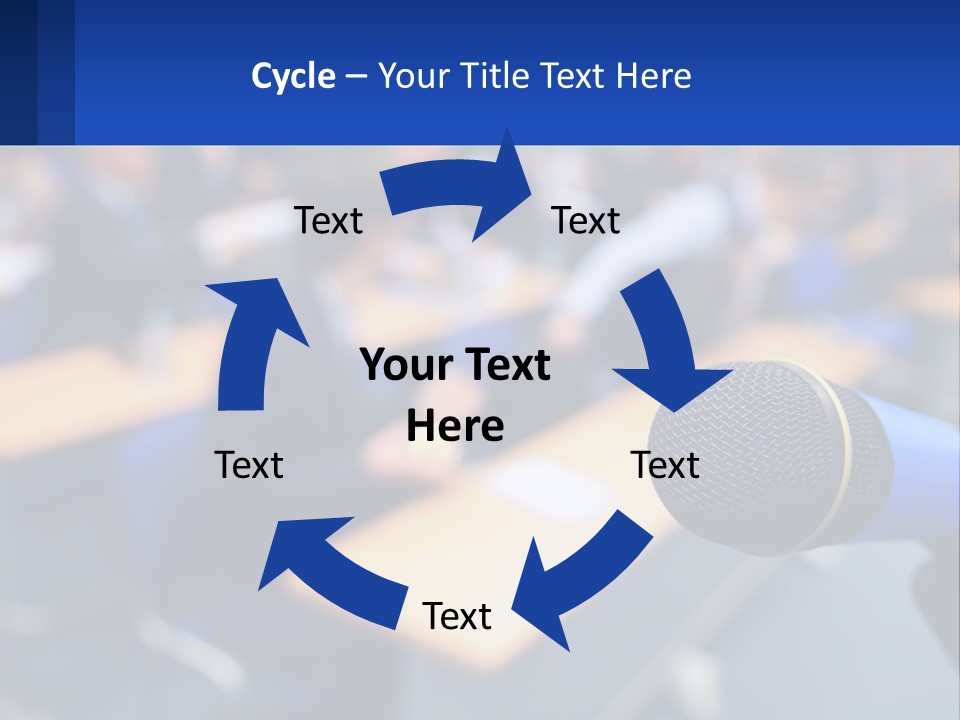 A Microphone In Front Of A Lecture Hall Full Of People PowerPoint Template