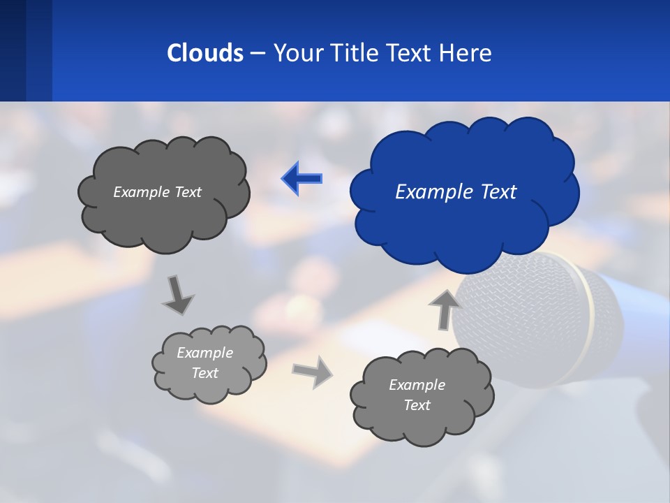 A Microphone In Front Of A Lecture Hall Full Of People PowerPoint Template
