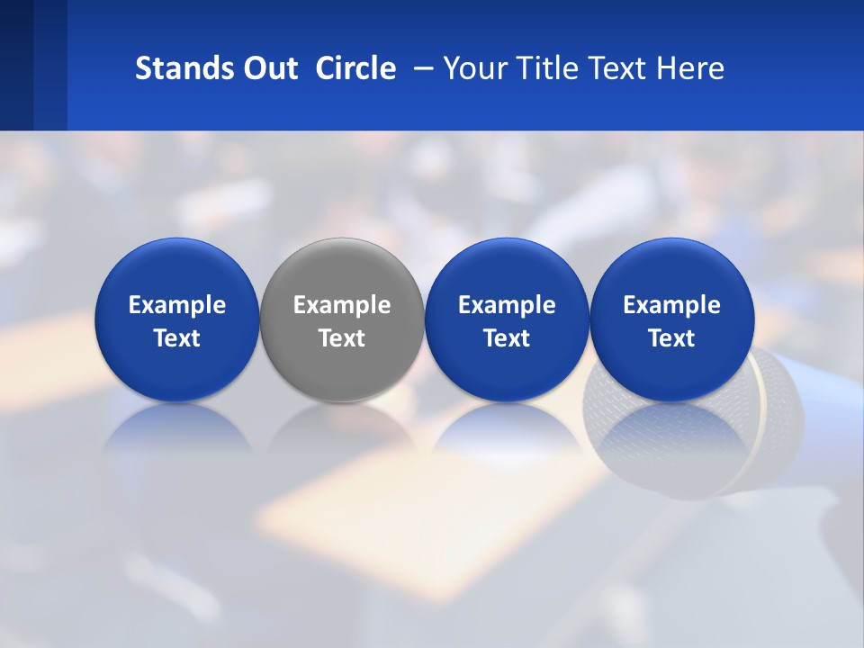 A Microphone In Front Of A Lecture Hall Full Of People PowerPoint Template