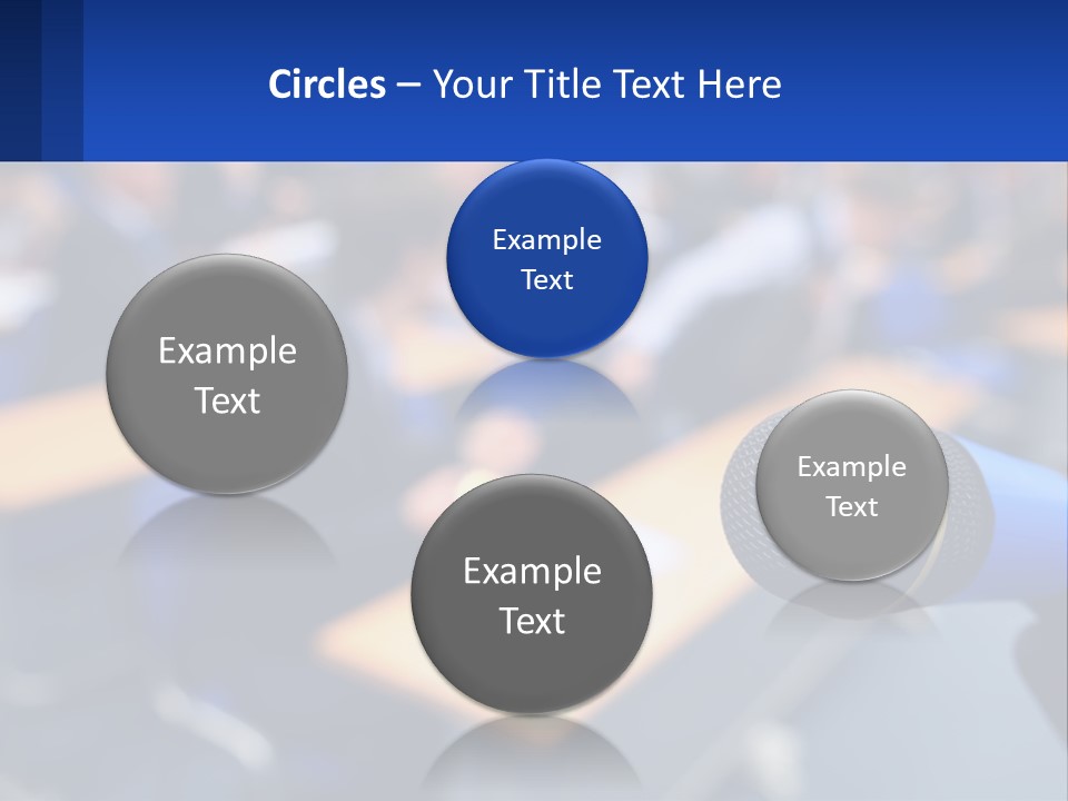 A Microphone In Front Of A Lecture Hall Full Of People PowerPoint Template