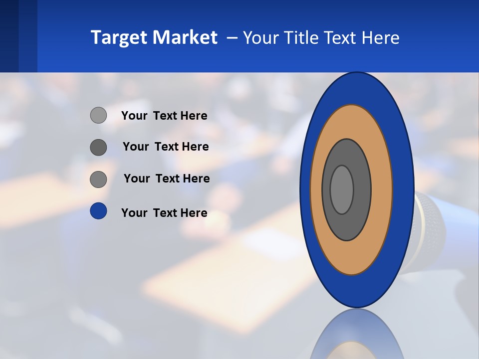 A Microphone In Front Of A Lecture Hall Full Of People PowerPoint Template