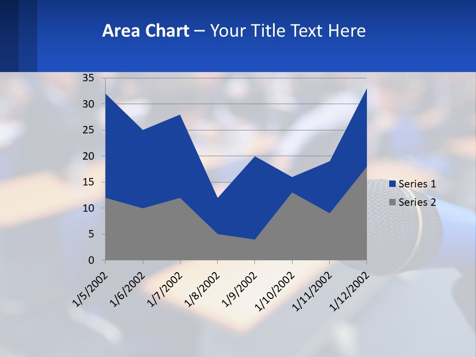 A Microphone In Front Of A Lecture Hall Full Of People PowerPoint Template