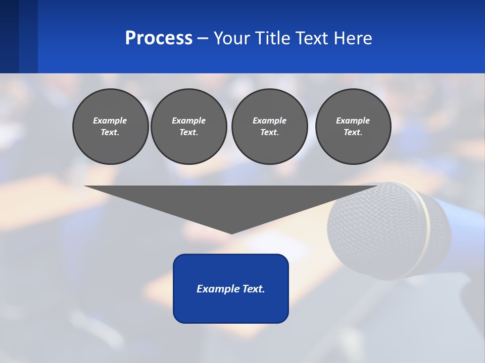 A Microphone In Front Of A Lecture Hall Full Of People PowerPoint Template
