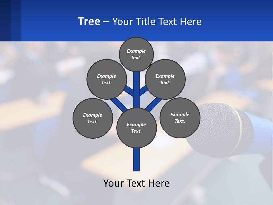 A Microphone In Front Of A Lecture Hall Full Of People PowerPoint Template