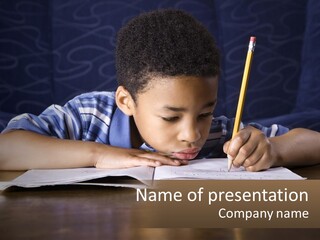 A Young Boy Writing On A Piece Of Paper With A Pencil PowerPoint Template
