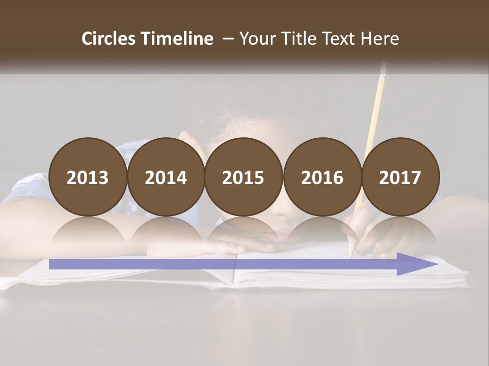 A Young Boy Writing On A Piece Of Paper With A Pencil PowerPoint Template