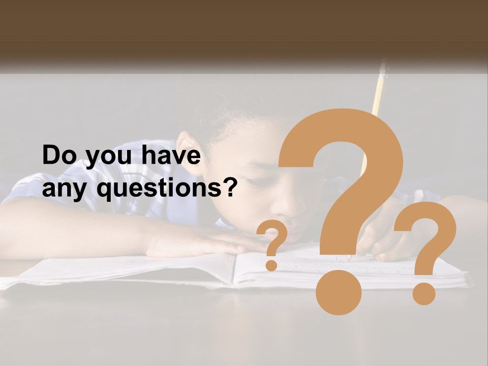 A Young Boy Writing On A Piece Of Paper With A Pencil PowerPoint Template