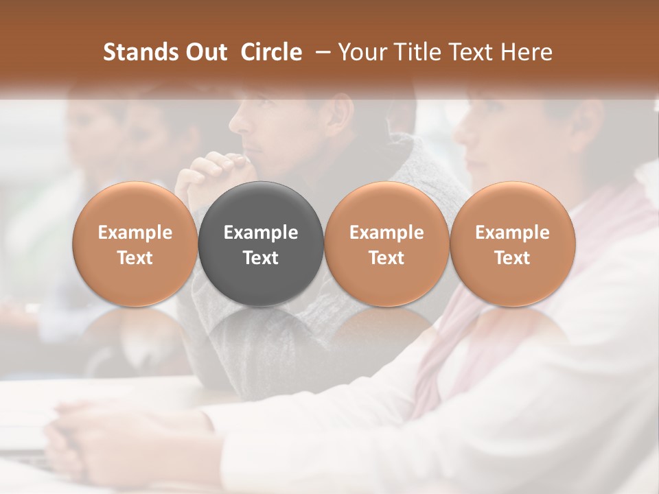 A Group Of People Sitting In Front Of A Laptop Computer PowerPoint Template