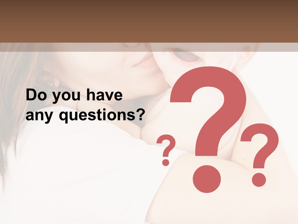 A Woman Holding A Baby In Her Arms PowerPoint Template