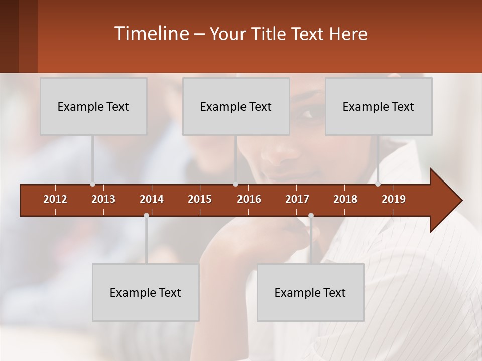 A Group Of People Sitting At A Table In Front Of A Computer Screen PowerPoint Template