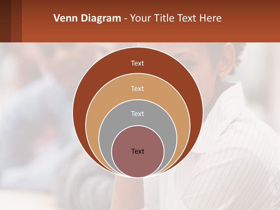 A Group Of People Sitting At A Table In Front Of A Computer Screen PowerPoint Template