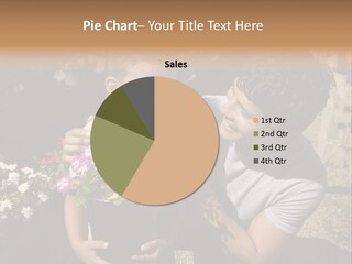 A Man Holding A Child In A Flower Shop PowerPoint Template