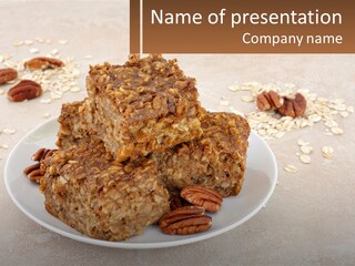 A White Plate Topped With Three Pieces Of Granola PowerPoint Template