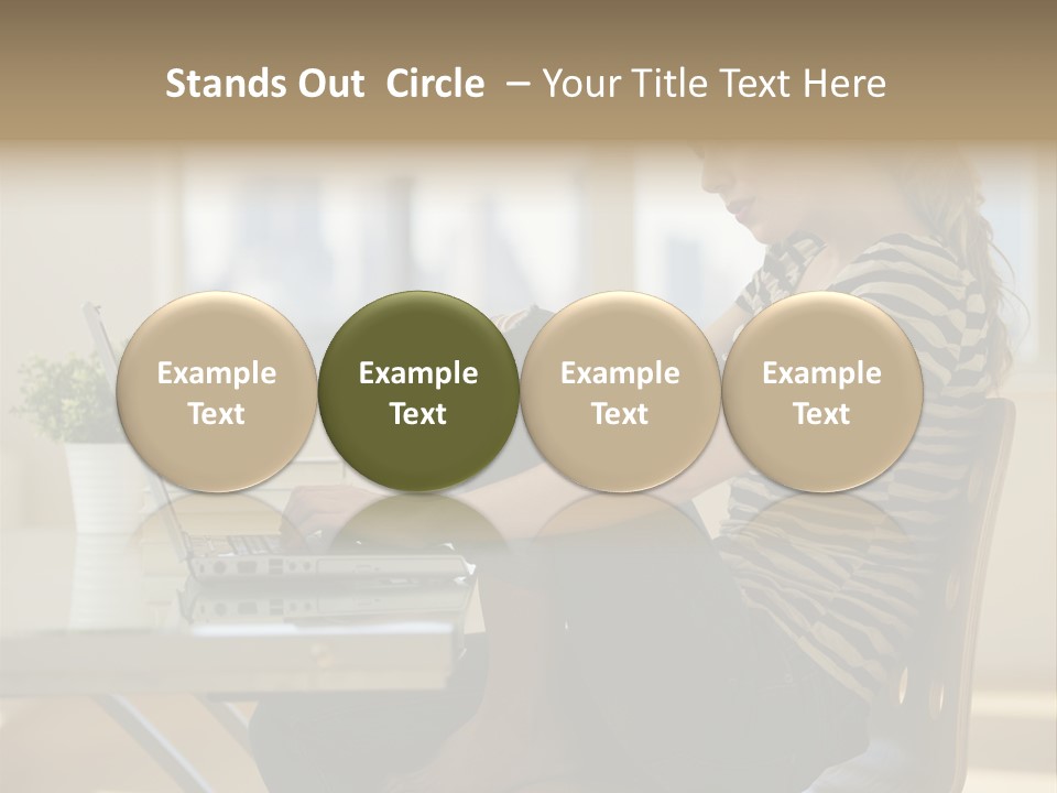 A Woman Sitting On A Chair Using A Laptop Computer PowerPoint Template