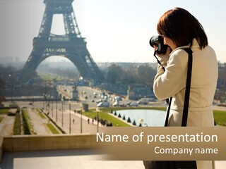 A Woman Taking A Picture Of The Eiffel Tower PowerPoint Template