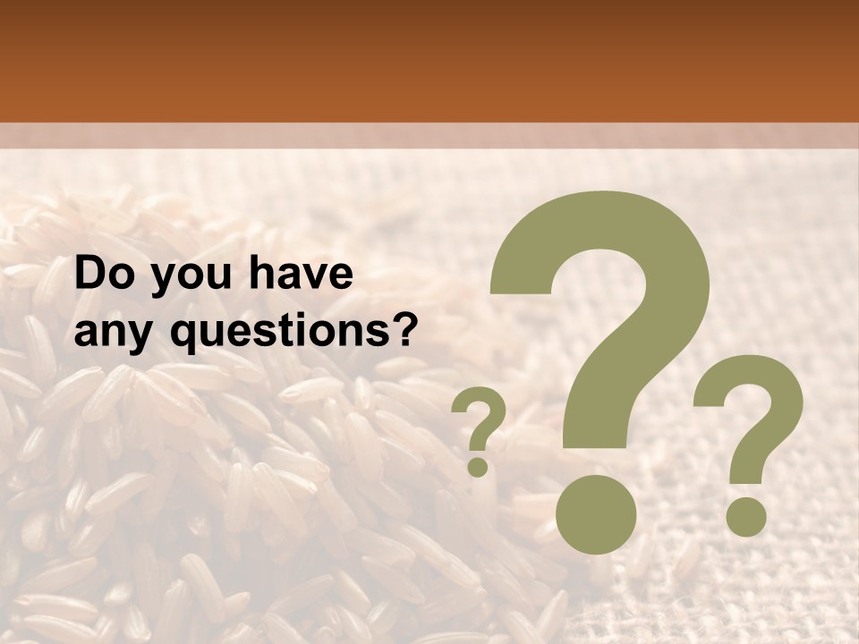 A Pile Of Brown Rice On Top Of A Table PowerPoint Template