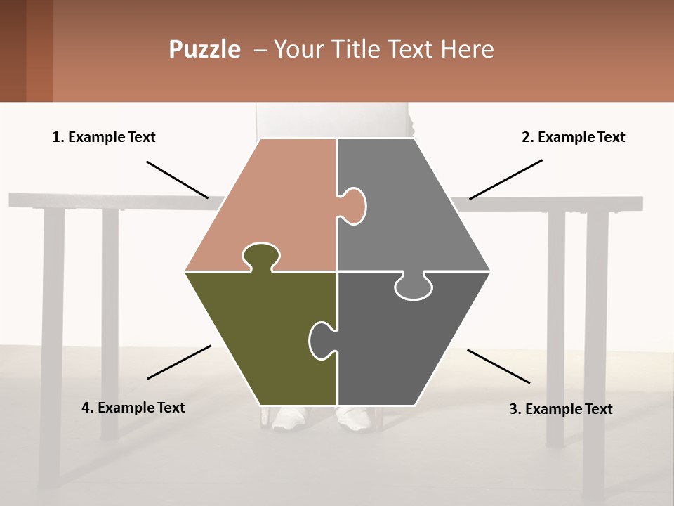 A Man Sitting At A Table Using A Laptop Computer PowerPoint Template