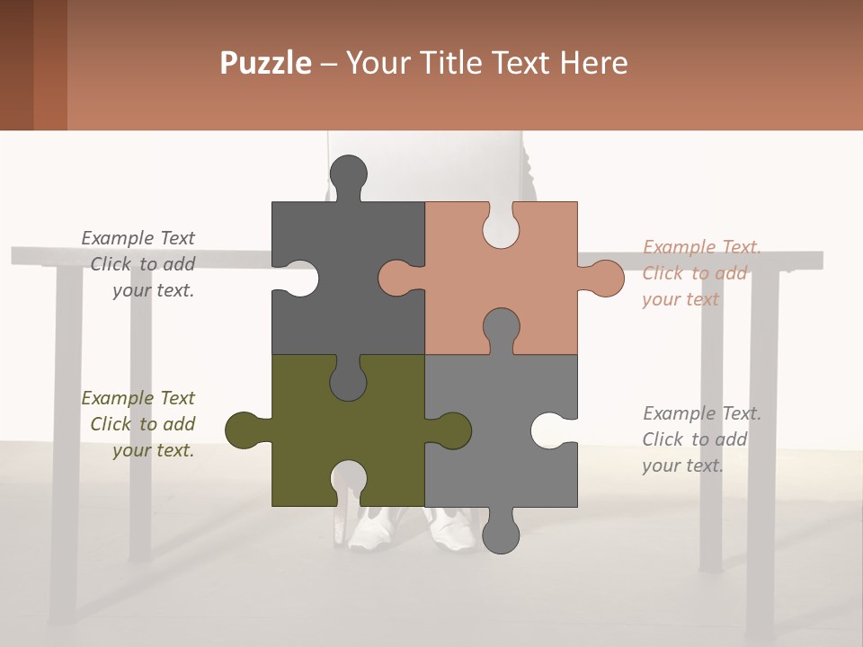 A Man Sitting At A Table Using A Laptop Computer PowerPoint Template